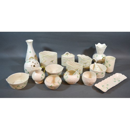 61 - A Belleek Honey Pot together with a collection of other Belleek ceramics to include jugs, bowls and ... 