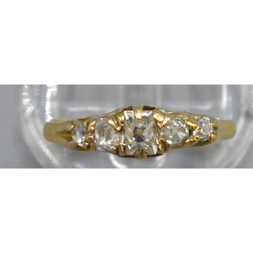 317 - An 18ct. Yellow Gold Five Stone Diamond Ring set with five graduated diamonds within a pierced setti... 