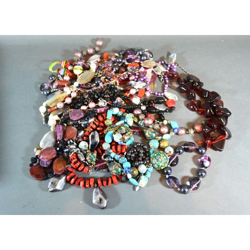 325 - A Collection of Drop Earrings together with a large collection of bead necklaces and other jewellery