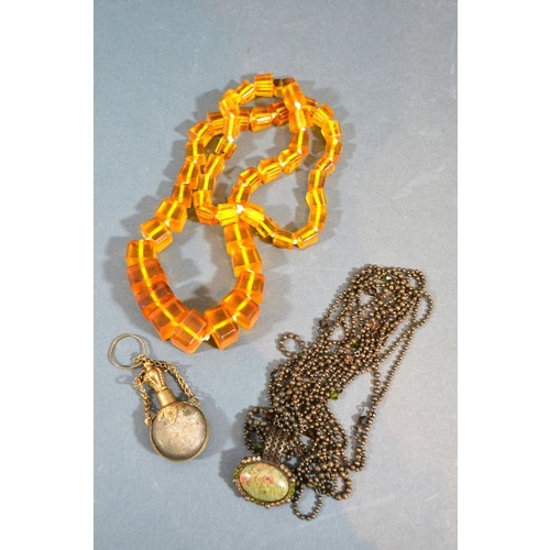 226 - An Amber Coloured Bead Necklace together with another necklace set cabochon hard stone and a small g... 