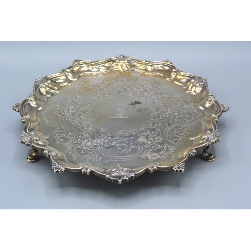 72 - A George III Silver Salver of shaped scroll outline with three hoof supports, London 1799, 16 ozs. 2... 