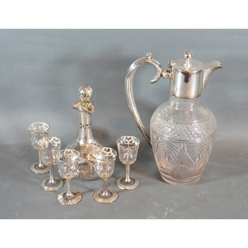 81 - A Silver Plated And Cut Glass Claret Jug together with a glass drinking set