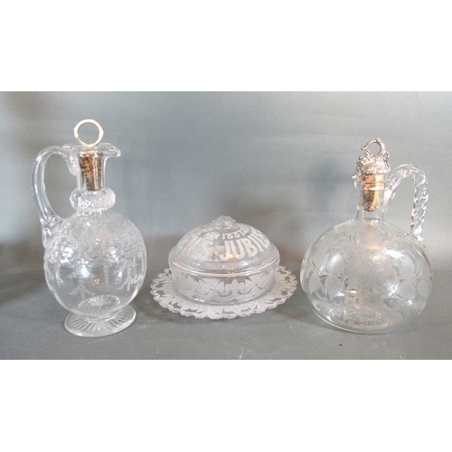 11 - A 19th Century Glass Claret Jug Etched With Roses together with another similar claret jug and a Vic... 