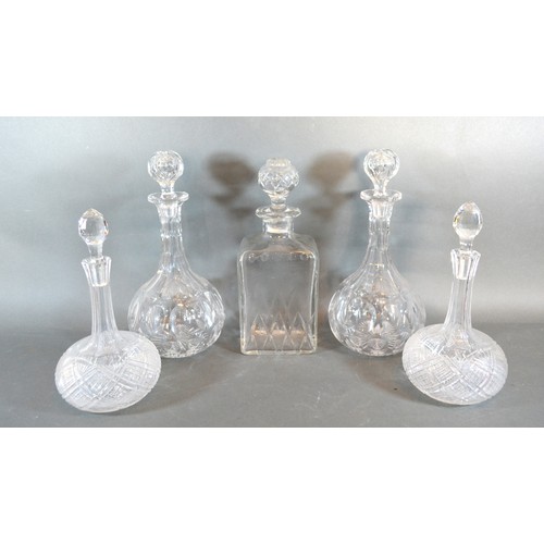 12 - Two Pairs Of Cut Glass Decanters together with another similar of rectangular form