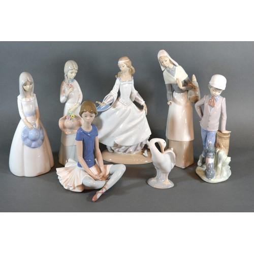 17 - A Lladro Porcelain Model Of A Girl together with two other Lladro porcelain figures and various othe... 