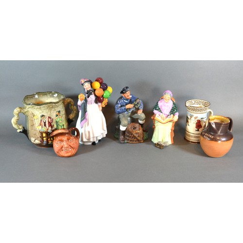 18 - A Royal Doulton Figure 'The Lobster Man' HN2317 together with another 'The Family Album' HN 2321, an... 