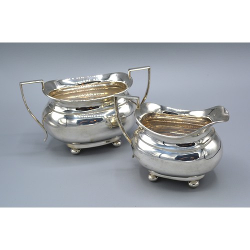 99 - A George V Silver Two Handled Sucrier together with a matching cream jug, Birmingham 1924, 11 ozs.