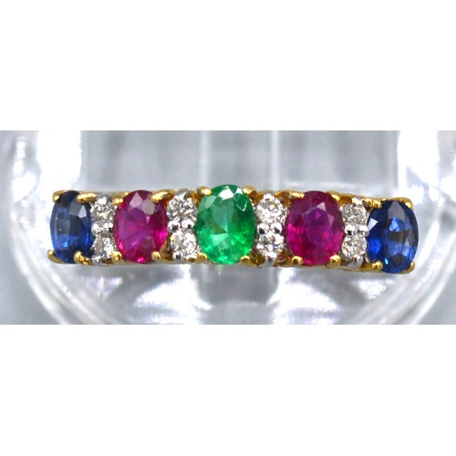 103 - An 18ct Gold Multi Gem Set Band Ring set with sapphire, ruby, emerald and diamonds 2.4 gms. ring siz... 