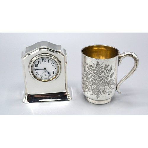 169 - A Victorian Silver Christening Mug with engraved decoration, London 1894 together with a silver case... 