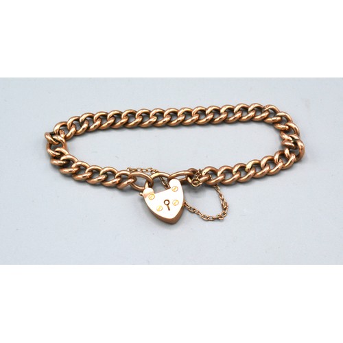 154 - A 9ct. Gold Curb Link Bracelet with Padlock Clasp 10.4 gms.