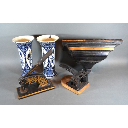 281 - An Ebonised Clock Bracket together with two printing press and a pair of Delft vases