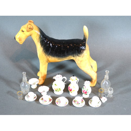 29 - A Beswick Model Of An Airedale together with a collection of glass miniature tea ware