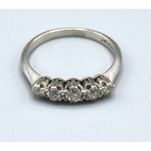 112 - A Platinum Five Stone Diamond Ring set with five graduated diamonds within a pierced setting 3.1 gms... 