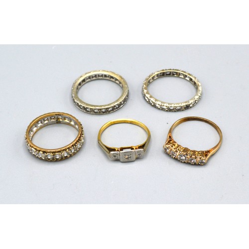 114 - An 18ct. Gold And Platinum Diamond Set Ring set with three diamonds within an illusion setting toget... 