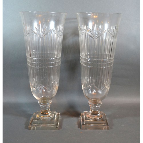 35 - A Pair Of Cut Glass Flared Rim Storm Vases with square stepped bases 45 cms tall