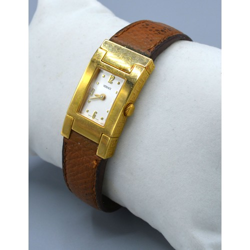 188 - A Versace Gold Plated G20 Wrist Watch with leather strap and original buckle numbered 790138-0719