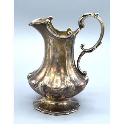 213 - A Victorian Silver Cream Jug of shaped ribbed form and with shaped foot, London 1844, maker's mark B... 