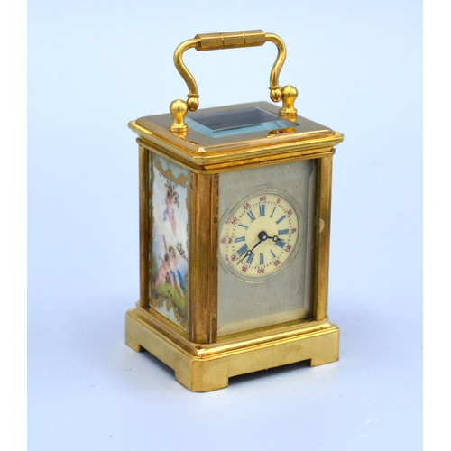 321 - A Miniature Brass Cased Carriage Clock with sevres style panels and silvered dial with lever escapem... 