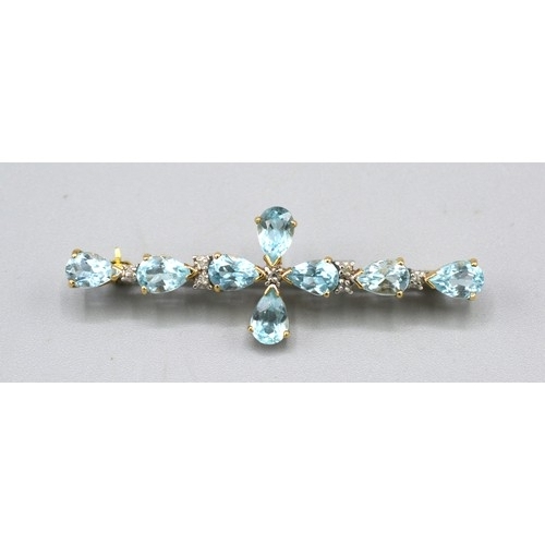 115 - A 9ct. Gold Aquamarine And Diamond Set Brooch set with eight aquamarine interspaced with diamonds, 4... 