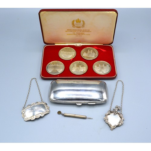 365 - Two Silver Decanter Labels, a silver propelling pick, a silver plated cigarette case and a set of pr... 