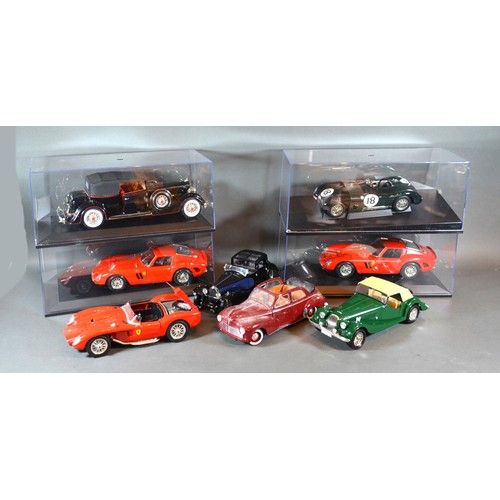 26 - A Model Jaguar C Type in racing livery together with three Ferraris by Burago and four other model c... 