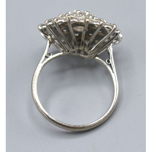 445 - An 18ct White Gold Diamond Set Large Cluster Ring with large central diamond surrounded by diamonds ... 