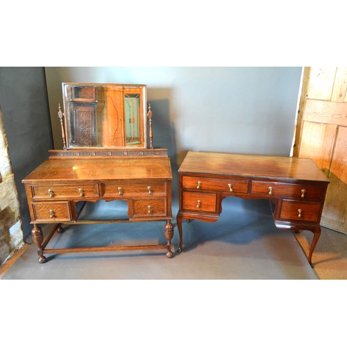 640 - A 20th Century Oak Sideboard with a low galleried back above three drawers and three moulded doors r... 