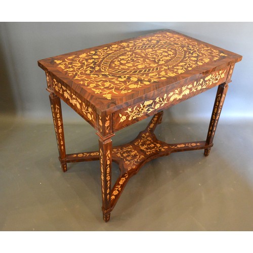 676 - A French style marquetry inlaid rectangular centre table, the profusely inlaid top above a similar f... 