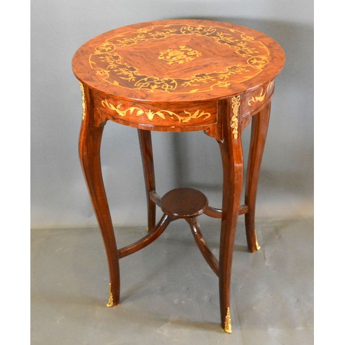 683 - A French style marquetry inlaid gilt metal mounted circular occasional table, the marquetry inlaid t... 