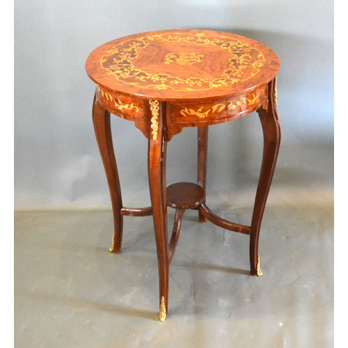 683 - A French style marquetry inlaid gilt metal mounted circular occasional table, the marquetry inlaid t... 