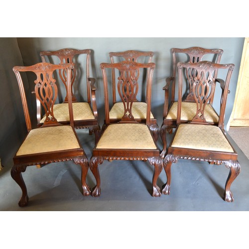 602 - A Mahogany Dining Suite, comprising of extending dining table, the moulded top above a plain frieze ... 