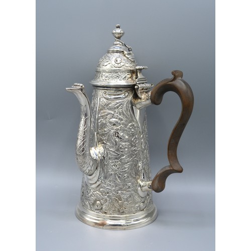 109 - A Continental White Metal Chocolate Pot with shaped handle 24 ozs. 25 cms tall