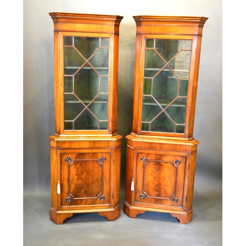 358 - *** Collect or Donate *** A Pair Of Mahogany Standing Corner Cabinets, the moulded tops above astrag... 