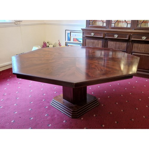 360 - *** Collect *** A 20th Century Mahogany Octagonal Centre Table, the cross banded top above a square ... 