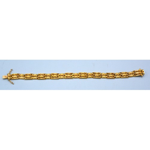 124 - An 18ct. Yellow Gold Linked Bracelet 19.5cms long 16gms.