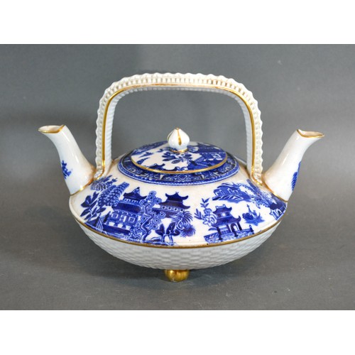 28 - A 19th Century Worcester Double Spouted Teapot decorated in underglaze blue and with gilded feet