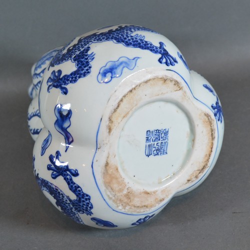 22 - A 19th Century Chines porcelain Gourd vase of triform decorated in undeglaze blue with serpents, blu... 