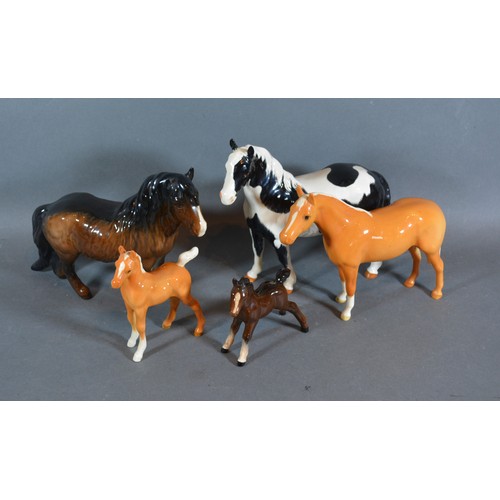 20 - A Beswick model in the form of horse together with three other Beswick horses and a Beswick pony