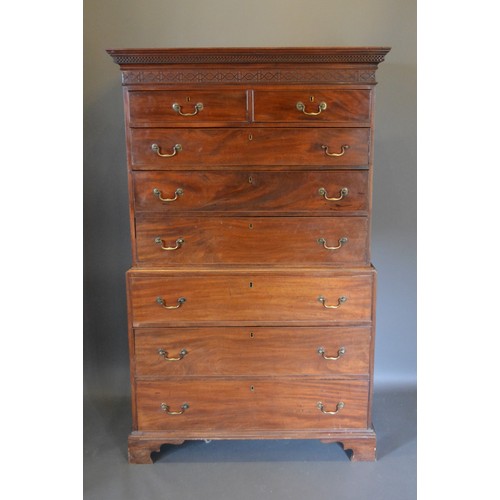 320 - A 19th Century mahogany chest on chest, the moulded cornice above two short and six long drawers rai... 