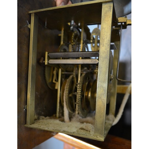 273 - A 19th Century oak long case clock the rectangular hood with brass finials above a rectangular door,... 