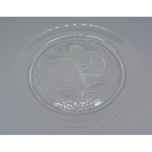 18 - A Lalique glass annual plate, Dream Rose flower pattern, signed Lalique France, 21.5cms diameter