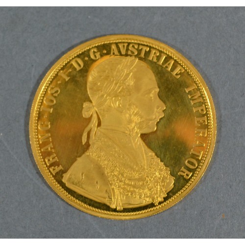 124 - An Austrian gold four Ducat dated 1915, 13.9 grams