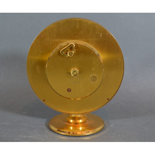 270 - An Imhof Hours Of The World Time Clock, the circular dial within a brass case, 12cms tall