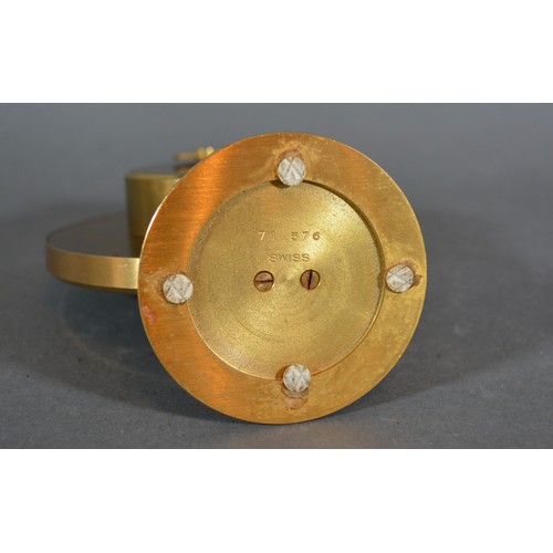 270 - An Imhof Hours Of The World Time Clock, the circular dial within a brass case, 12cms tall