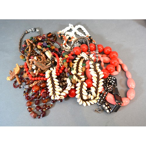 184 - A Bead Necklace set multi-coloured glass beads together with a small collection of other necklaces t... 