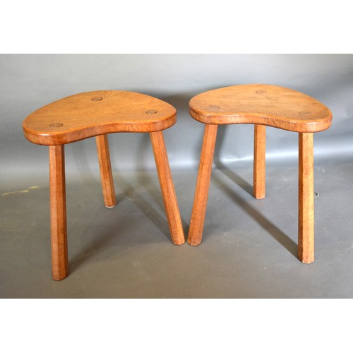 332 - Robert (Mouseman) Thompson, A Pair of Oak Stools of Kidney Form, each raised upon tapering octagonal... 