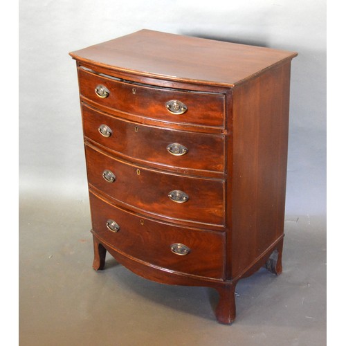 347 - A Mahogany Bow Fronted Small Chest of four drawers with oval brass handles raised upon outswept legs... 