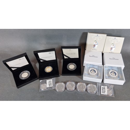 92 - A set of four silver proof two pound coins together with seven silver proof coins