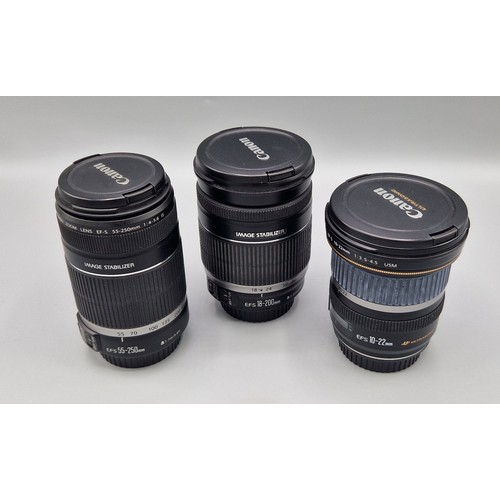 243 - A Canon EFS 18-200mm Lens, together with a Canon EFS 55-250mm lens and a Canon EFS 10-22mm Lens