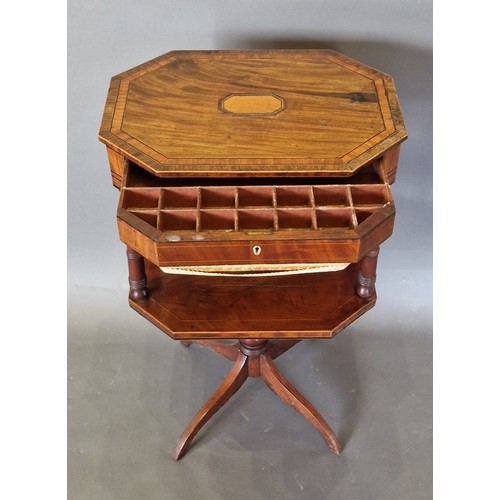 343 - A Regency mahogany and Satinwood crossbanded work table with wool box raised upon turned supports wi... 